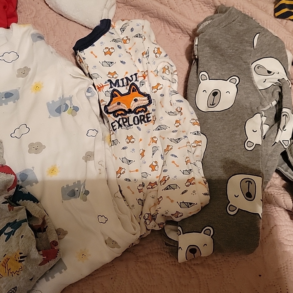 Boys sleepers 6 to 9 months worn once. No stains in excellent condition.